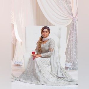 I am selling this beautiful silver/grey lehenga suit